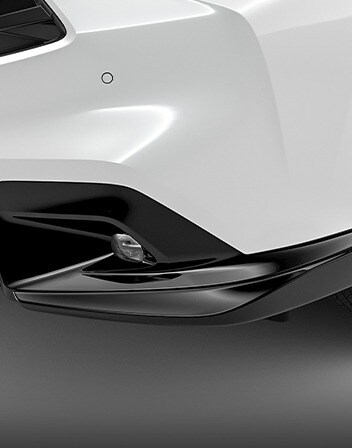 Se muestra la Acura ADX 2026 color Platinum White Pearl con los deflectores de chasis delanteros accesorios. Se muestra la Acura ADX 2026 color Platinum White Pearl con los deflectores de chasis delanteros accesorios.