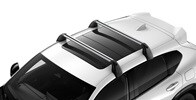 Se muestra la Acura ADX 2026 en Platinum White Pearl con el portaequipaje accesorio.