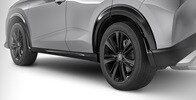Se muestra la Acura ADX 2026 en Platinum White Pearl con el conjunto de protectores contra salpicaduras accesorio.