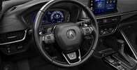 Interior de la Acura ADX 2026 con volante calefaccionado accesorio.