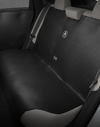 Interior de la Acura ADX 2026 con el recubrimiento de la cabina trasera para mascotas accesorio. Interior de la Acura ADX 2026 con el recubrimiento de la cabina trasera para mascotas accesorio.