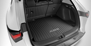 Interior de la Acura ADX 2026 con los protectores para los respaldos de los asientos accesorios.