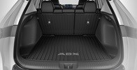 Interior de la Acura ADX 2026 con la bandeja de carga accesoria.