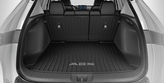 Interior de la Acura ADX 2026 con la bandeja de carga accesoria.