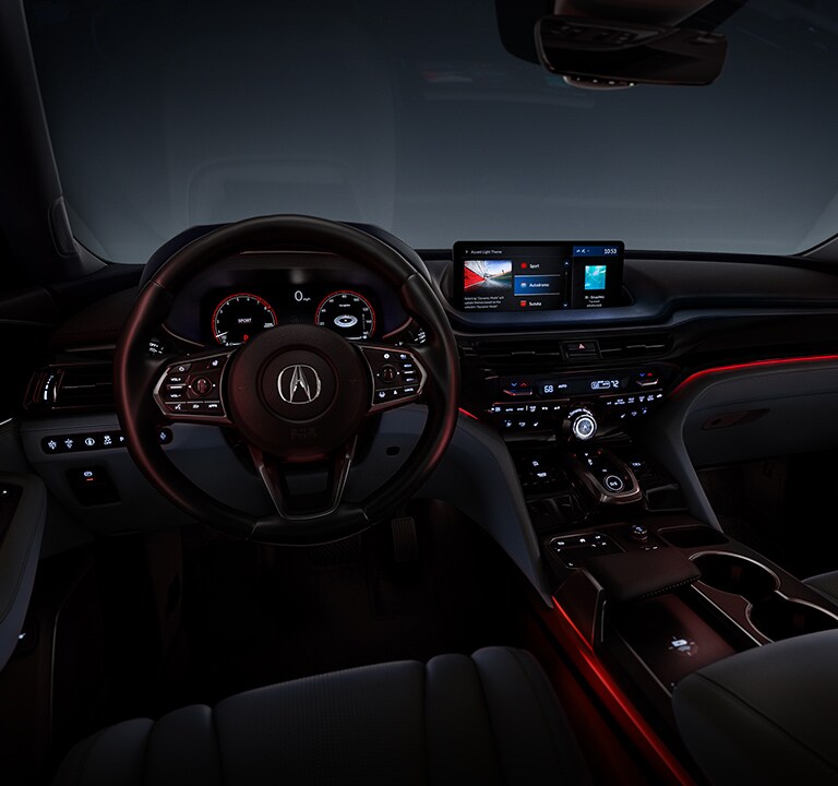 Cabina de la Acura MDX 2022 con Paquete Avanzado en color Ebony con iluminación ambiental Autódromo