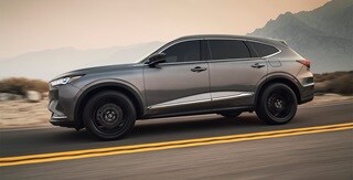 El elegante diseño moderno de la Acura MDX 2022 en Liquid Carbon Metallic