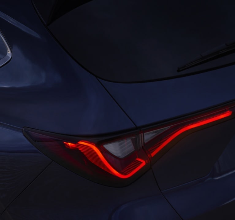 Acura MDX 2025 con luces delanteras de LED Jewel Eye® y luces traseras de LED Chicane™ ahumadas