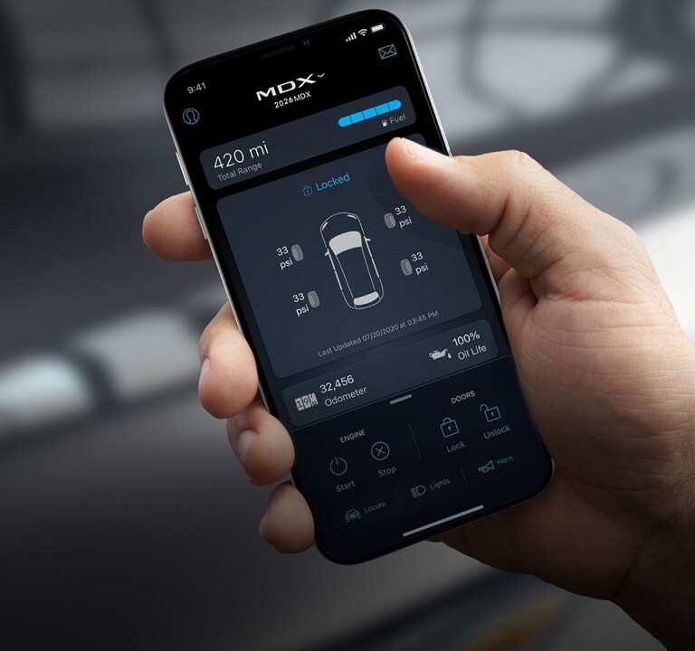 Acura MDX 2026 con servicios conectados AcuraLink en un teléfono