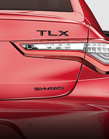 Emblemas en negro brillante del Acura TLX 2025.