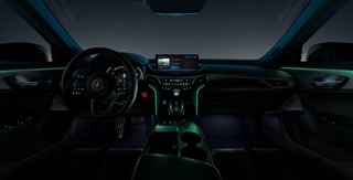 Acura TLX 2025 con Paquete A-Spec e interior de color Ebony con iluminación ambiental Atlantic Road. Acura TLX 2025 con Paquete A-Spec e interior de color Ebony con iluminación ambiental Atlantic Road.