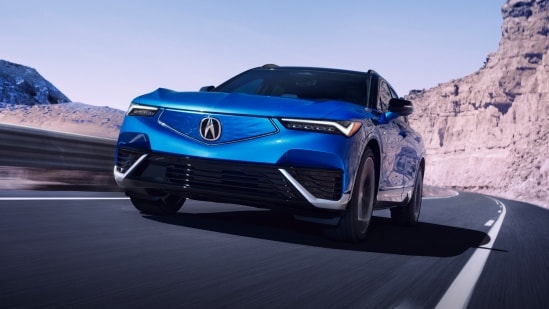 Acura 2024 ZDX Type S in Double Apex Blue Pearl on the road