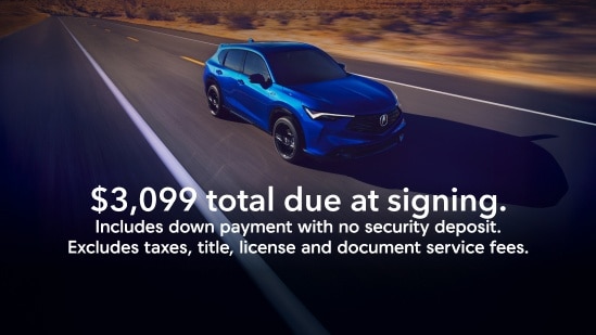 Acura ADX 2025 en Adriatic Sea Blue Metallic circulando por una autopista desértica